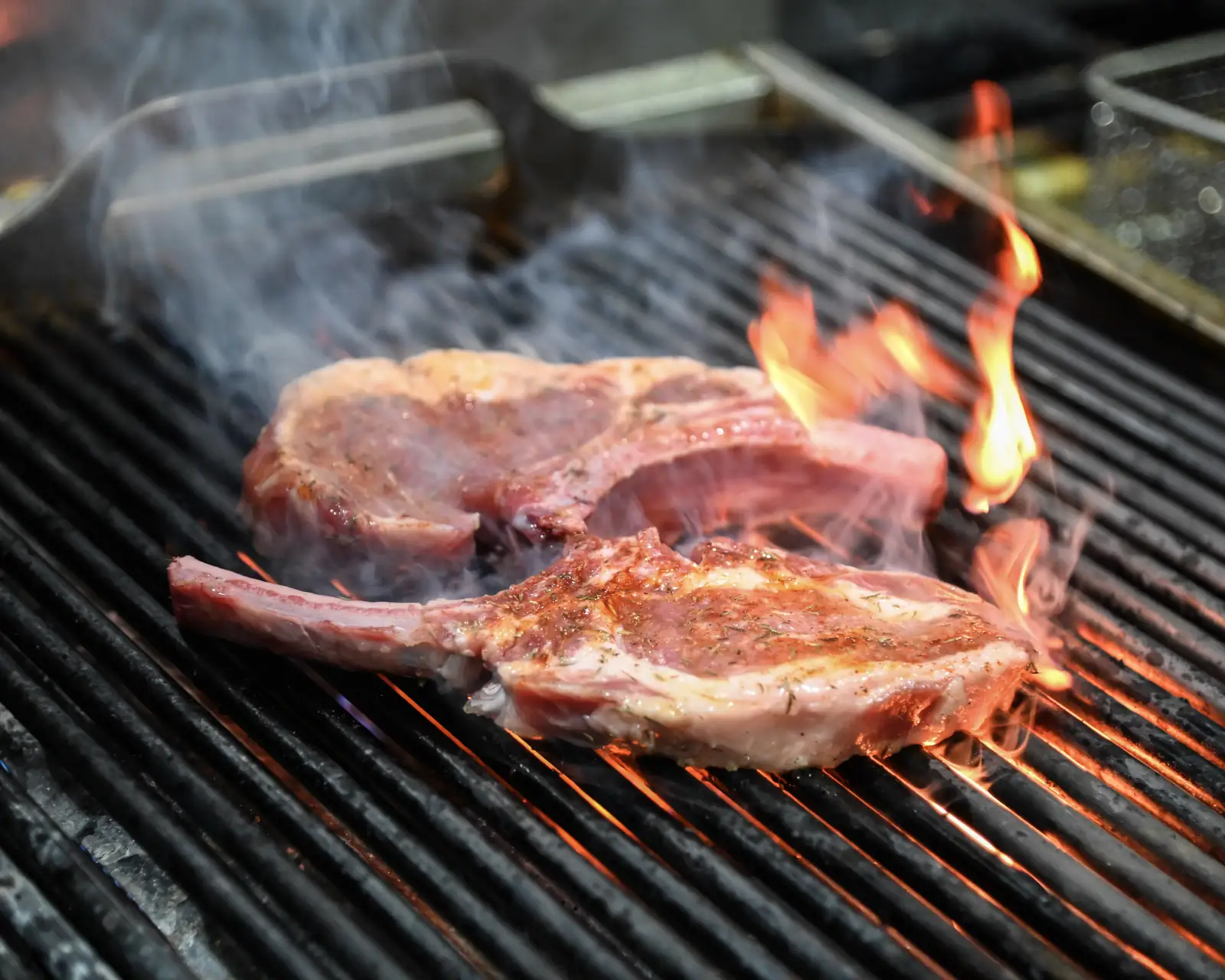 Chops over open flame on the grill